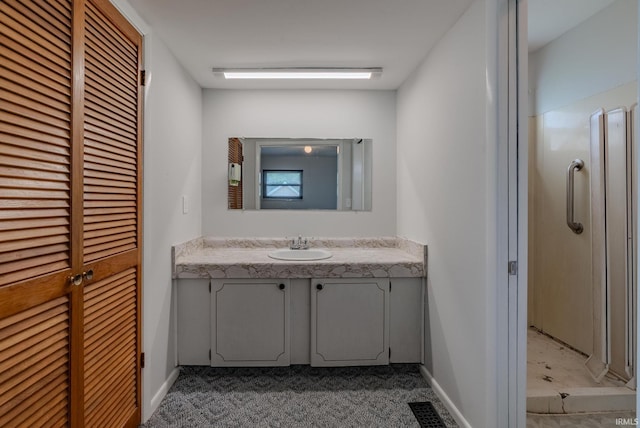 1113 E 500 S, Wabash, IN 46992 - bathroom featuring vanity, a stall shower, and baseboards