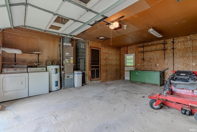 1113 E 500 S, Wabash, IN 46992 - garage featuring washing machine and dryer, electric water heater, a garage door opener, and heating unit