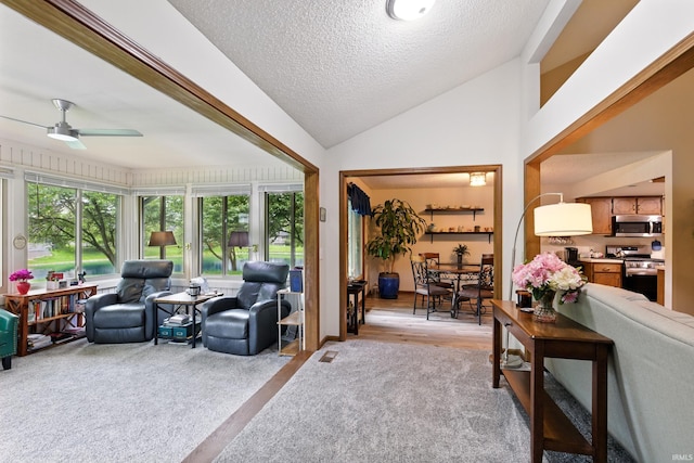 5816 Bayside Dr, Fort Wayne, IN 46815 - living room featuring ceiling fan, light colored carpet, lofted ceiling, and a textured ceiling
