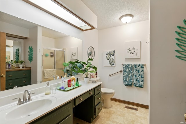 5816 Bayside Dr, Fort Wayne, IN 46815 - bathroom featuring vanity, a shower stall, toilet, a textured ceiling, and baseboards