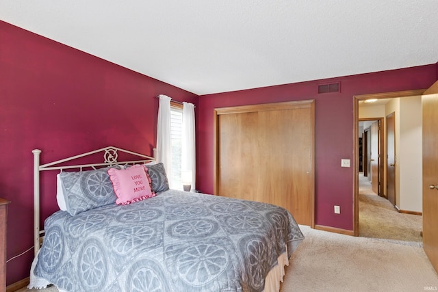 5816 Bayside Dr, Fort Wayne, IN 46815 - bedroom featuring carpet flooring, a closet, and baseboards