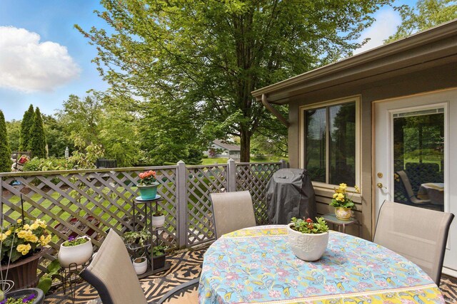 5816 Bayside Dr, Fort Wayne, IN 46815 - wooden deck with outdoor dining space and grilling area