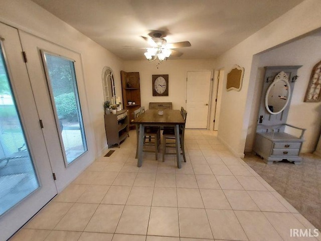 1749 W 1st St, Jasper, IN 47546 - dining space with light tile patterned floors and ceiling fan