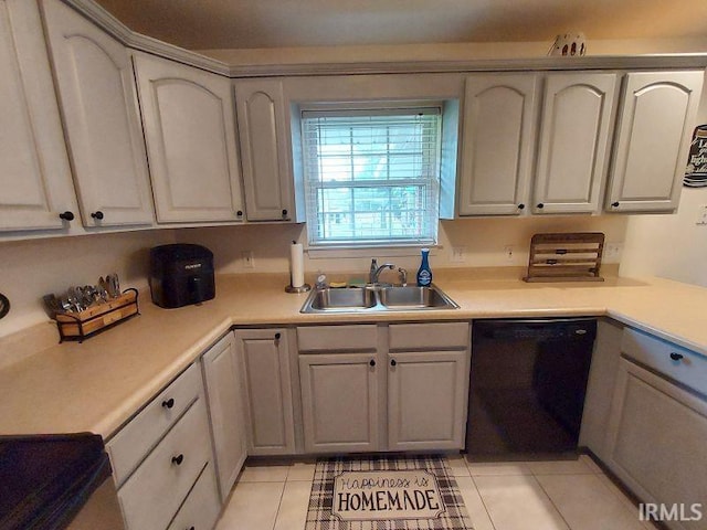 1749 W 1st St, Jasper, IN 47546 - kitchen with black dishwasher, a sink, light tile patterned floors, and light countertops