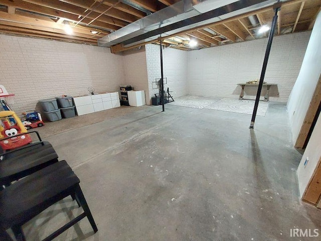 1749 W 1st St, Jasper, IN 47546 - unfinished basement with brick wall