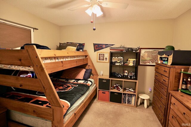 8707 Ash Bourne Dr, Fort Wayne, IN 46804 - bedroom with carpet flooring, a textured ceiling, and ceiling fan