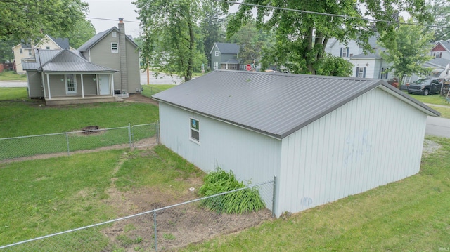 208 N Heaton St, Knox, IN 46534 - view of side of property with metal roof