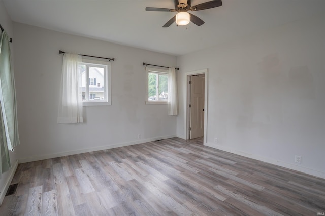 208 N Heaton St, Knox, IN 46534 - empty room featuring wood finished floors, ceiling fan, and baseboards