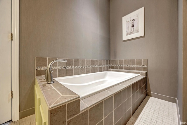 723 E Moss Creek Dr, Bloomington, IN 47401 - bathroom with a garden tub, tile patterned flooring, and baseboards