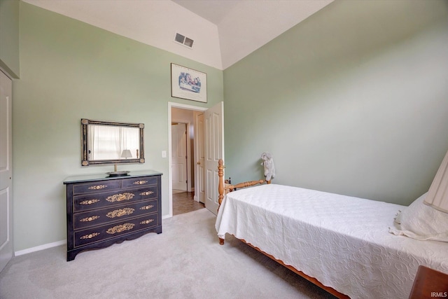 723 E Moss Creek Dr, Bloomington, IN 47401 - bedroom featuring high vaulted ceiling, light carpet, and baseboards