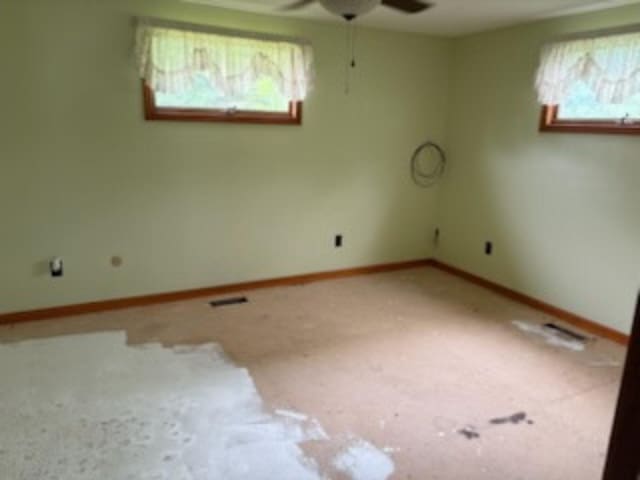 1144 E 30th St, Marion, IN 46953 - unfurnished room featuring a ceiling fan and baseboards