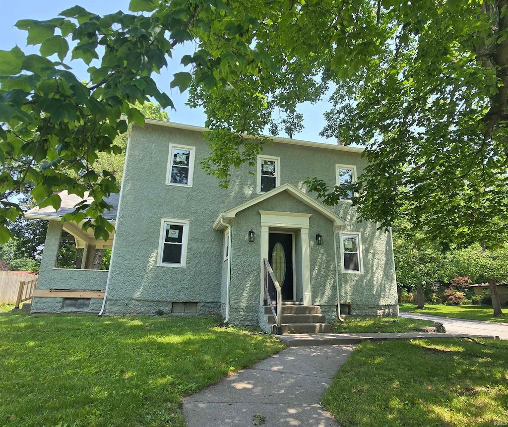 216 Carlin St, Auburn, IN 46706 - view of front of property with stucco siding and entry steps