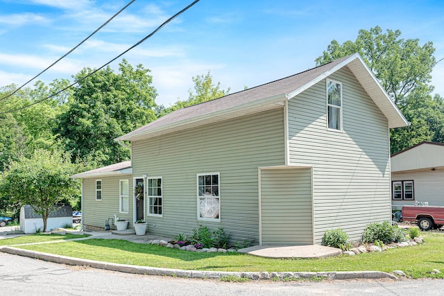 501 Spring Beach Rd, Rome City, IN 46784 - view of property exterior featuring a yard