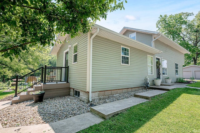 501 Spring Beach Rd, Rome City, IN 46784 - view of home's exterior with a yard