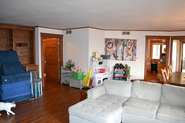 523 S Bluff St, Monticello, IN 47960 - living room with hardwood / wood-style flooring and ornamental molding