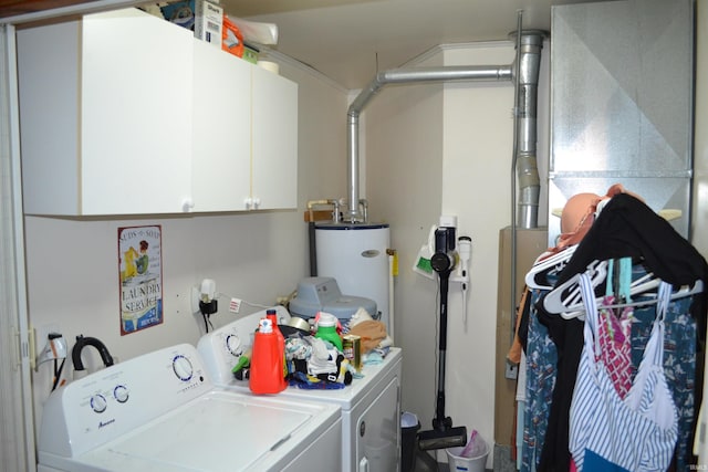 523 S Bluff St, Monticello, IN 47960 - laundry area with washing machine and clothes dryer, cabinet space, and gas water heater