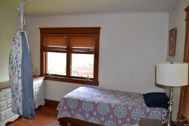 523 S Bluff St, Monticello, IN 47960 - bedroom with hardwood / wood-style flooring and ornamental molding