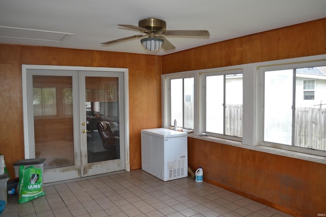 523 S Bluff St, Monticello, IN 47960 - unfurnished sunroom with tile patterned floors and wood walls