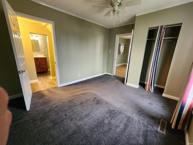 206 S Van Buren St, Monroe, IN 46772 - unfurnished bedroom featuring crown molding, carpet, baseboards, a closet, and ceiling fan
