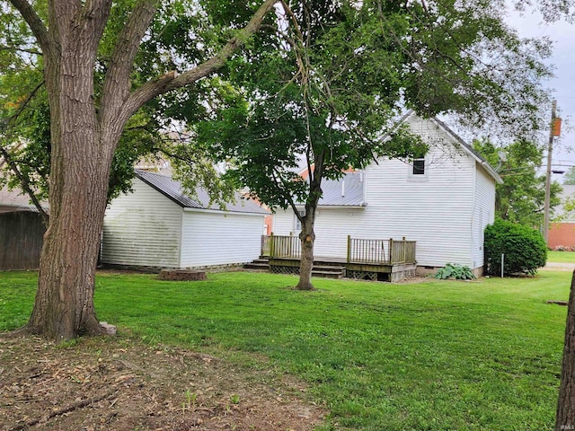 206 S Van Buren St, Monroe, IN 46772 - view of grassy yard with a wooden deck