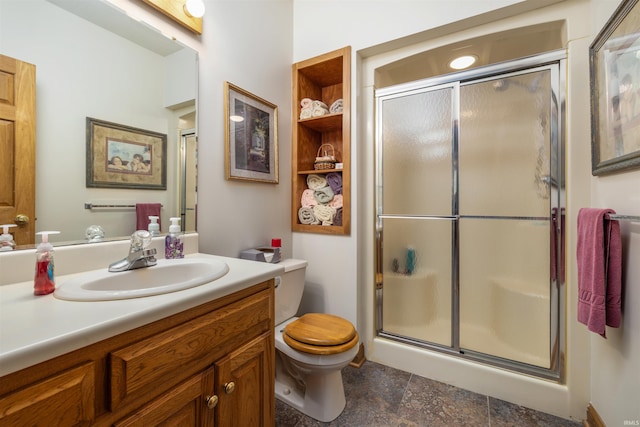 6615 Cherry Hill Pkwy, Fort Wayne, IN 46835 - full bathroom with toilet, vanity, a shower stall, and stone finish floors