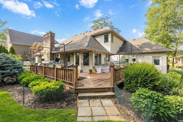 6615 Cherry Hill Pkwy, Fort Wayne, IN 46835 - rear view of property with a deck, roof with shingles, and a chimney