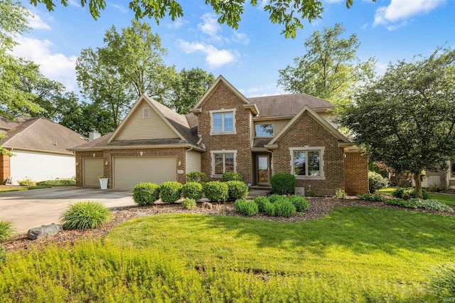6615 Cherry Hill Pkwy, Fort Wayne, IN 46835 - view of front of property with brick siding, a garage, a front yard, and concrete driveway