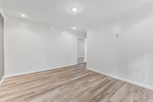 340 W Turner St, Bloomfield, IN 47424 - spare room with ornamental molding, light wood finished floors, baseboards, and recessed lighting