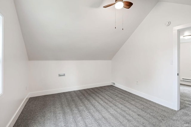 503 Graceland Ave, Claypool, IN 46510 - additional living space with carpet flooring, lofted ceiling, a ceiling fan, baseboards, and baseboard heating