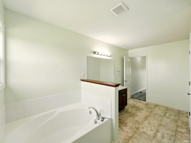 13395 Synch Ct, Fort Wayne, IN 46814 - bathroom featuring vanity and a garden tub