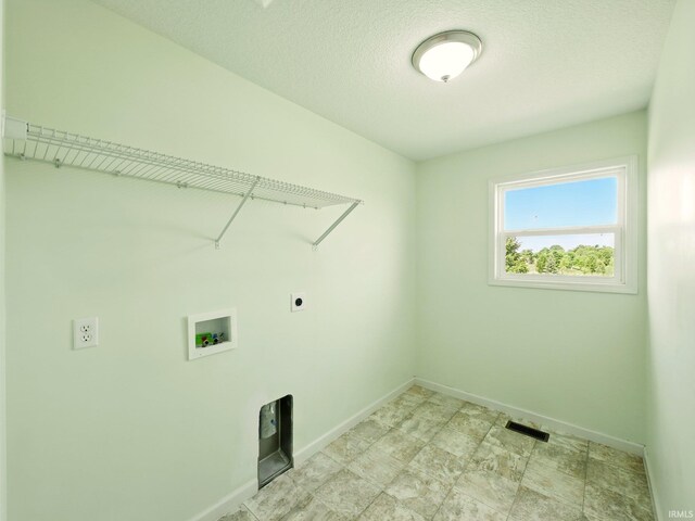 13395 Synch Ct, Fort Wayne, IN 46814 - washroom featuring hookup for a washing machine, hookup for an electric dryer, and baseboards