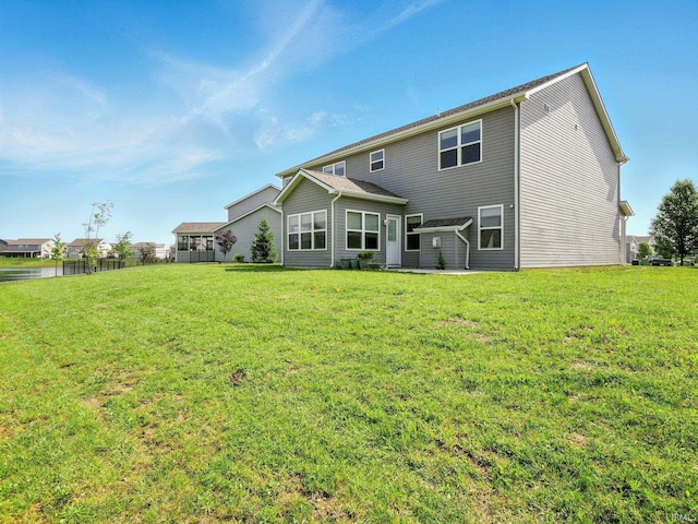 13395 Synch Ct, Fort Wayne, IN 46814 - back of house featuring a yard
