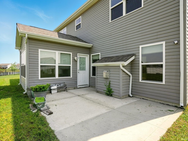 13395 Synch Ct, Fort Wayne, IN 46814 - back of house with a patio area and a lawn