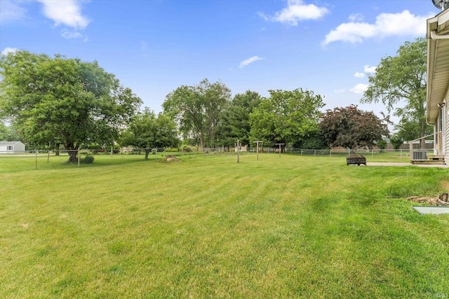 25651 Cypress Ct, Elkhart, IN 46517 - view of yard featuring a fire pit