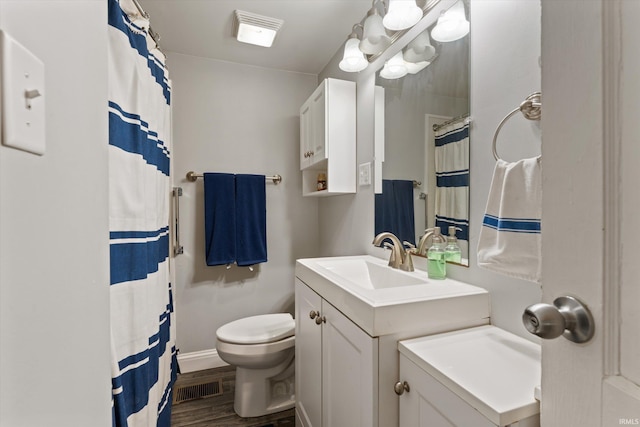 2527 Woodmont Dr, South Bend, IN 46614 - bathroom featuring toilet, vanity, wood finished floors, and curtained shower