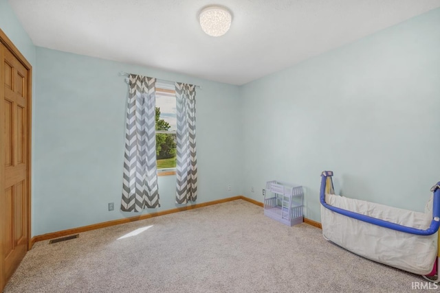 230 Meadows Dr, Greentown, IN 46936 - unfurnished bedroom with carpet flooring and baseboards