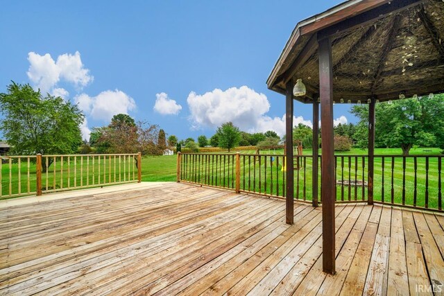 230 Meadows Dr, Greentown, IN 46936 - deck featuring a lawn