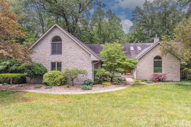 5920 E Lampkins Ridge Rd, Bloomington, IN 47401 - view of front of property with stone siding, a front lawn, and a chimney