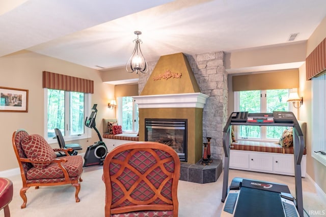 5920 E Lampkins Ridge Rd, Bloomington, IN 47401 - carpeted living area featuring plenty of natural light, a large fireplace, and baseboards