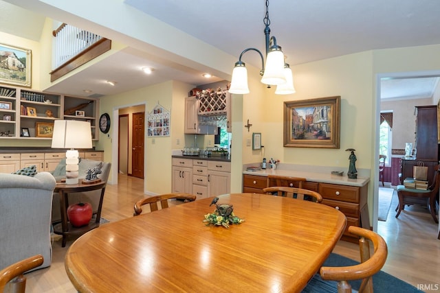 5920 E Lampkins Ridge Rd, Bloomington, IN 47401 - dining room featuring bar area and light wood-type flooring