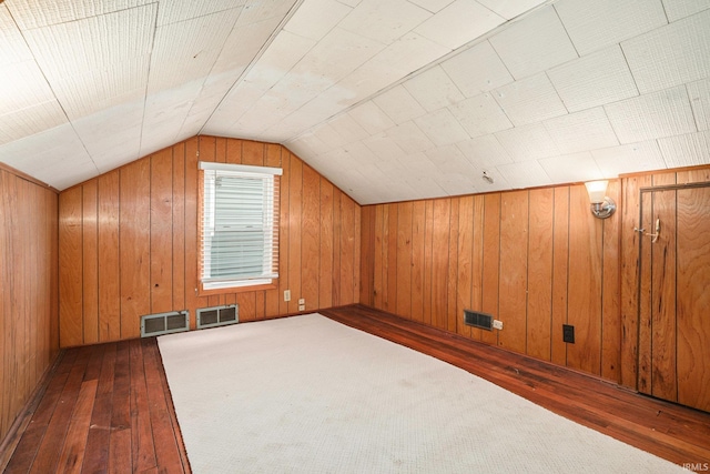 1826 E Donald St, South Bend, IN 46613 - additional living space featuring hardwood / wood-style floors, lofted ceiling, and wood walls