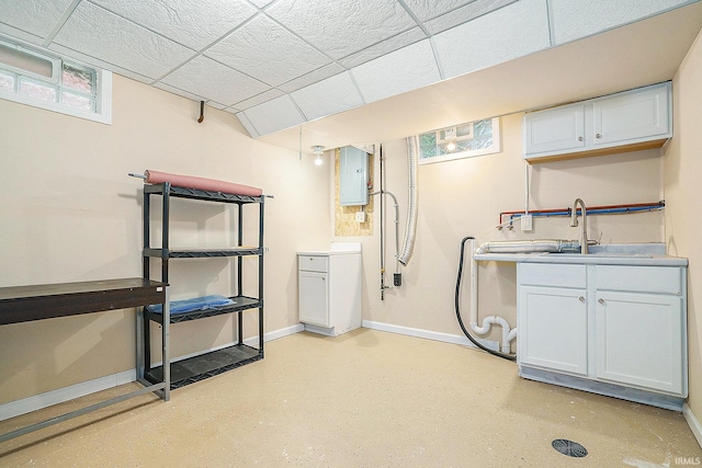 1826 E Donald St, South Bend, IN 46613 - below grade area featuring electric panel, baseboards, and a sink