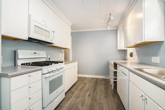 1826 E Donald St, South Bend, IN 46613 - kitchen with white appliances, rail lighting, white cabinets, dark wood-style floors, and crown molding