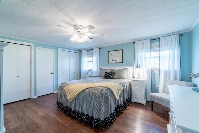 620 Ln 330 Big Otter Lk, Fremont, IN 46737 - bedroom with ornamental molding, dark wood finished floors, multiple closets, and ceiling fan