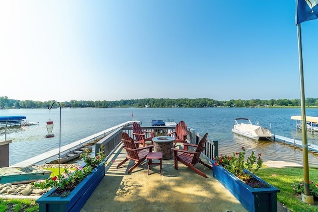 620 Ln 330 Big Otter Lk, Fremont, IN 46737 - dock area featuring a water view and a fire pit