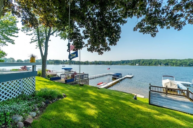 620 Ln 330 Big Otter Lk, Fremont, IN 46737 - dock with a water view and a lawn