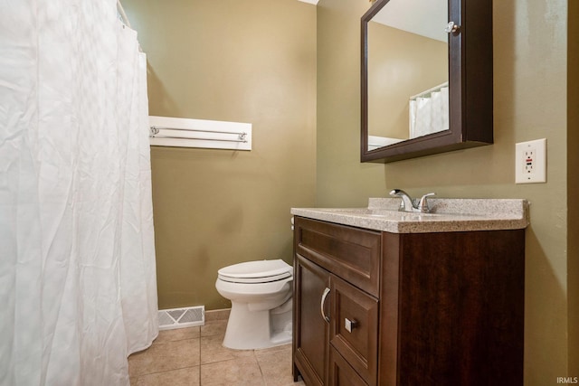 10227 Jefferson Rd, Osceola, IN 46561 - bathroom featuring vanity, toilet, tile patterned floors, baseboards, and curtained shower