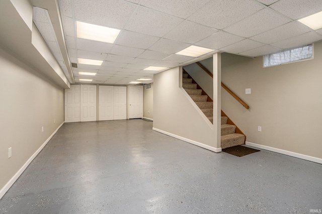 10227 Jefferson Rd, Osceola, IN 46561 - below grade area featuring baseboards, a paneled ceiling, and stairs