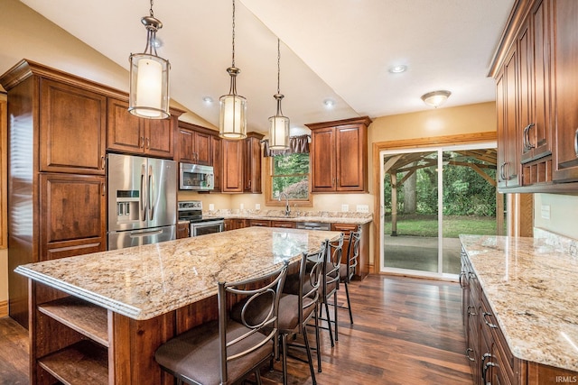 10227 Jefferson Rd, Osceola, IN 46561 - kitchen with appliances with stainless steel finishes, lofted ceiling, a sink, dark wood-type flooring, and light stone counters