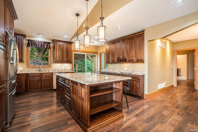 10227 Jefferson Rd, Osceola, IN 46561 - kitchen with open shelves, stainless steel refrigerator, vaulted ceiling, dark wood-type flooring, and plenty of natural light